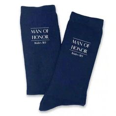 two socks with the words man of honor printed on them