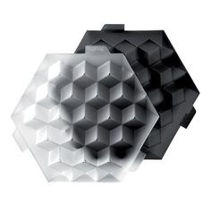 an abstract object is shown in black and white, with hexagonal shapes on it