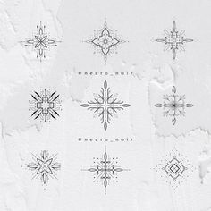 six different snowflakes are shown in black and white on a paper textured background