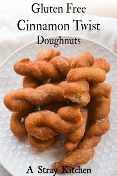 gluten free cinnamon twist doughnuts on a white plate with text overlay