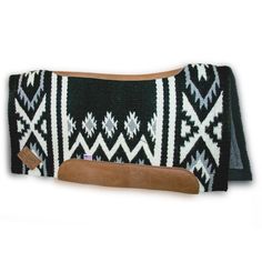 a black and white knitted purse with brown leather trim