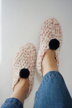 Ready to ship, these hand-crocheted wonders make for the perfect holiday gift.  Warm and snug, these cozy booties are guaranteed to give your feet the warm and fuzzies this Christmas. Give the gift of warmth and style to your loved ones, offering them a touch of handmade luxury that transcends the ordinary. Whether it's a treat for yourself or a thoughtful present for someone special, our women's bootie slippers are bound to bring joy and comfort to anyone lucky enough to slip their feet into them. Embrace the charm of handmade craftsmanship and the unparalleled comfort of 100% bulky wool with our women's bootie slipper. It's not just footwear; it's a wearable work of art ready to accompany you on your coziest adventures. - Crafted with care, those bootie slippers are labor of love, with o Cozy Knitted Booties With Round Toe, Cozy Hand-knitted Slippers With Round Toe, Cozy Hand-knitted Round Toe Slippers, Cozy Hand Knitted Slippers With Round Toe, Cozy Handmade Winter Slippers, Handmade Comfortable Winter Booties, Hand Knitted Yarn Slippers For Winter, Handmade Cozy Yarn Slippers, Cozy Handmade Booties With Round Toe