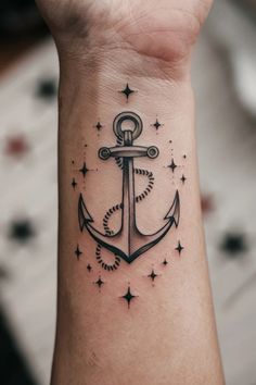 Anchor tattoo with rope detail, surrounded by small stars, on a forearm. Anchor Flower Tattoo, Anchor Tattoo Wrist, Nautical Symbols, Anchor Symbol, Small Anchor, Sailor Tattoo