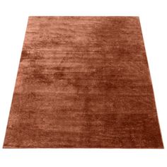 an orange rug on a white background with no one in it's photo or description