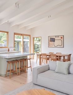 the kitchen and living room are separated by an open floor plan