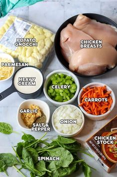 ingredients to make chicken broth laid out on a marble counter top with text overlay