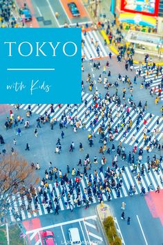 an aerial view of people crossing the street in tokyo, japan with text overlay that reads tokyo with kids