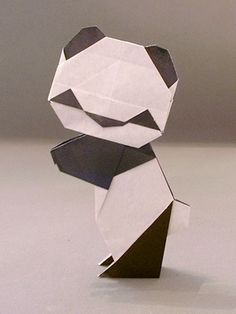 an origami panda bear made out of paper