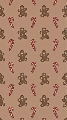 a brown background with gingerbreads and candy canes on it's sides