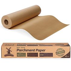 a roll of parchment paper next to a cardboard box