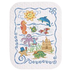 Dive into an underwater adventure with playful ocean pals in the nursery! This adorable baby quilt design features a delightfully sunny day at the beach as a dolphin, seahorse, octopus, and fish swim along the ocean waves and a turtle and starfish build a sandcastle on the beach! This design is stamped for stitching on pre-quilted white fabric with a bound edge. As it is pre-quilted and pre-finished, there are no extra sewing or quilting skills needed. Simply follow the easy-to-read chart and instructions to cross-stitch stamped design on the baby quilt, and it is ready for the nursery! Floss is not included. The finished baby quilt measures 34 x 43" (86 x 109cm). Imported.   This cross-stitch baby quilt is ready for stitching with a seahorse, fish, octopus, and dolphin surrounded by ocean Under The Sea Quilt, Disney Cross Stitch Kits, Cross Stitch Baby Blanket, Beach Theme Nursery, Quilted Tree Skirt, Stamped Cross Stitch Kits, Nursery Projects, Baby Blanket Ideas, Baby Quilt Kit