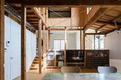 an empty room with tables and chairs in it