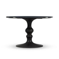 a black table with an oval top on a white background