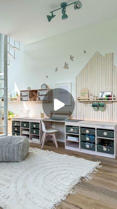 a living room filled with furniture and lots of storage under a loft style ceiling fan