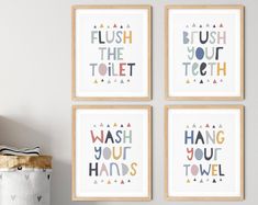 three colorful bathroom prints hanging on the wall