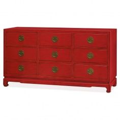 a red dresser with gold hardware on the top and bottom drawers, in front of a white background