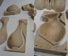 several woodworking pieces are arranged on a table