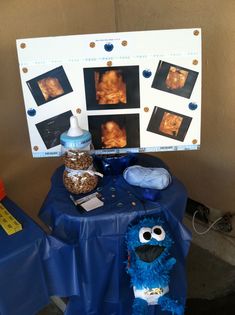 a blue table topped with a stuffed animal next to an x - ray