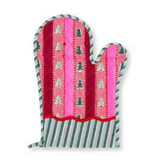 a pink oven mitt with green and red trees on it's front side