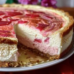 a cheesecake with strawberry topping on a plate