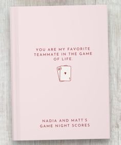 a pink book with the title you are my favorite team mate in the game of life