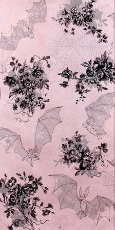 an image of bats and flowers on a blue background