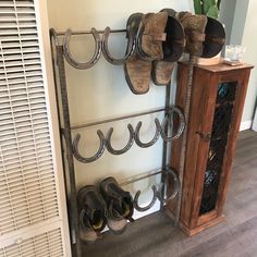 the shoe rack is holding several pairs of shoes