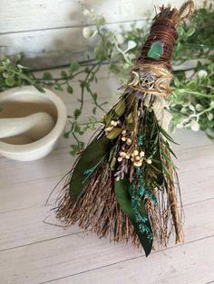 a bunch of dried flowers sitting on top of a table