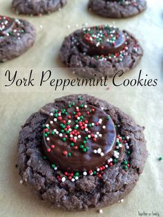 cookies with chocolate frosting and sprinkles on top