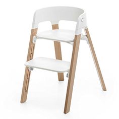 a white and wooden high chair on a white background