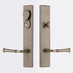 an image of two door handles with knobs on each one and the other side