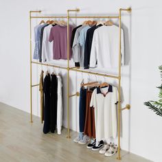 PRICES MAY VARY. INDUSTRIAL PIPE DESIGN - The clothing rack is designed to look great and is crafted from metal pipes, adding an industrial vintage style to your home or retail store. We designed this wall clothes rack to be really cool and eye-catching. STURDY AND DURABLE - This garment rack is very sturdy installed on solid wall. This item includes hardware to mount on concrete,tile walls or other types walls. OVERALL SIZE - 89.8in*93in*11.4in EASY TO INSTALL & REUSABLE - All parts are detacha Pipe Clothes Rack, Messy Clothes, Industrial Clothing, 4 Tier Shelf, Clothing Store Displays, Clothing Store Interior, Pipe Decor, Clothing Displays, Store Interiors