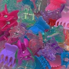 there are many different colored plastic toys