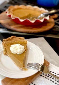 a slice of pie sitting on top of a white plate