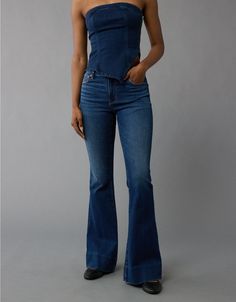 Fitted Full-length Denim Flares, High Rise Stretch Flares For Fall, Trendy High Rise Fitted Flares, Fitted Elastane Flares For Fall, Fall Fitted Elastane Flares, Trendy Fitted Full Length Flare Jeans, Trendy Fitted Jeans With Flared Hem, Fitted Mid-rise Denim Flares, Spring Fitted Flare Jeans