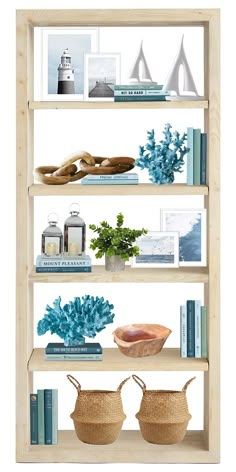 the shelves are filled with books, vases and other decorative items in blue tones