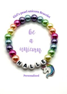 This adorable Unicorn charmed bracelet is made out of colorful pearls would make the perfect gift for a sweet little unicorn lover or birthday favors! 🎁Your bracelet will arrive in an organza bag making it ready to give as a gift. (includes 1 bracelet) WARNING! Chocking Hazard due to small parts. Not recommended for children under 3 years. Personalized Rainbow Fun Bracelets, Playful Rainbow Charm Bracelet For Gift, Multicolor Personalized Novelty Charm Bracelet, Unicorn Bangles, Unicorn Bracelet, Unicorn Charm Bracelet, Unicorn Party Favors, Unicorn Charm, Birthday Bracelet