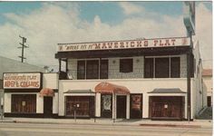 an old photo of the exterior of a restaurant