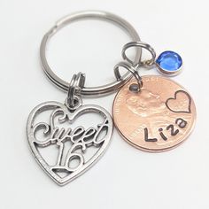 PERSONALIZED HAND STAMPED PENNY KEYCHAIN FOR 16TH BIRTHDAY - COMES WITH CHARMS SHOWN-  CUSTOMIZED WITH NAME AND YEAR OF BIRTH US PENNY *How Unique is this!! Personalize this lucky penny keychain with a name hand stamped  and your choice of penny year. Comes with charm & birthstone. It's the Perfect gift for Granddaughter, Niece, Daughter, or Friend. *Real U.S. Pennies are used *These are Hand stamped , each letter tapped individually by hand with hammer & metal punch. Therefore, there will be va Birthday Granddaughter, Penny Keychain, Birthday Best Friend, Gift For Granddaughter, Us Penny, Charmed Show, Lucky Penny, Friend Girlfriend, Girls 16