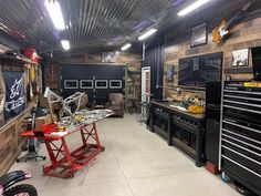 a garage filled with lots of tools and equipment