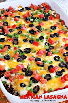 mexican lasagna casserole with black olives and tomatoes