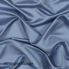 a close up view of a blue fabric