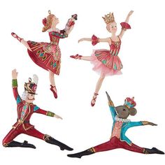 three figurines of ballet dancers in red, pink and blue outfits with their arms outstretched