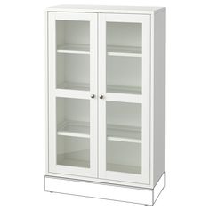 a white cabinet with glass doors and shelves