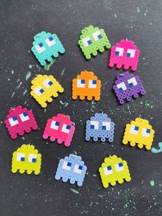 the pacman beads are all different colors and shapes