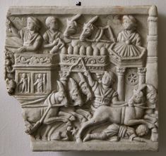 an ancient bask with people and animals on it