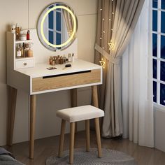 a white vanity table with a mirror and stool in front of a curtained window