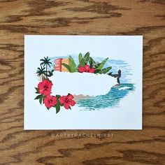 a card with flowers and a surfer in the ocean on it's back side