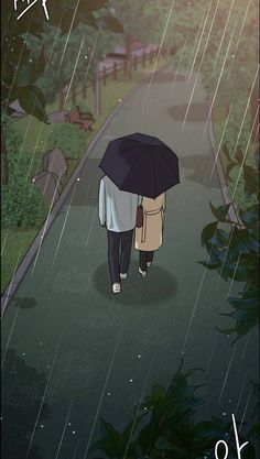 two people walking in the rain under an umbrella