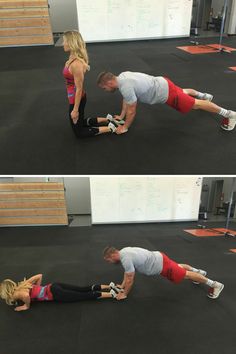 a man and woman doing push ups in the gym